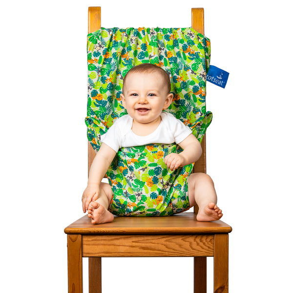 Our new Jungle Friends totseat comes on a soft ecru fabric featuring lions, monkeys and toucans on a jungle background. The totseat is ideal for your bouncy baby or to be given as a gift. Recommended for babies and toddlers aged 6-30 months, this lightweight and versatile chair harness anchors your child safely and comfortably in almost any dining chair you can find. totseat - the original portable travel high chair